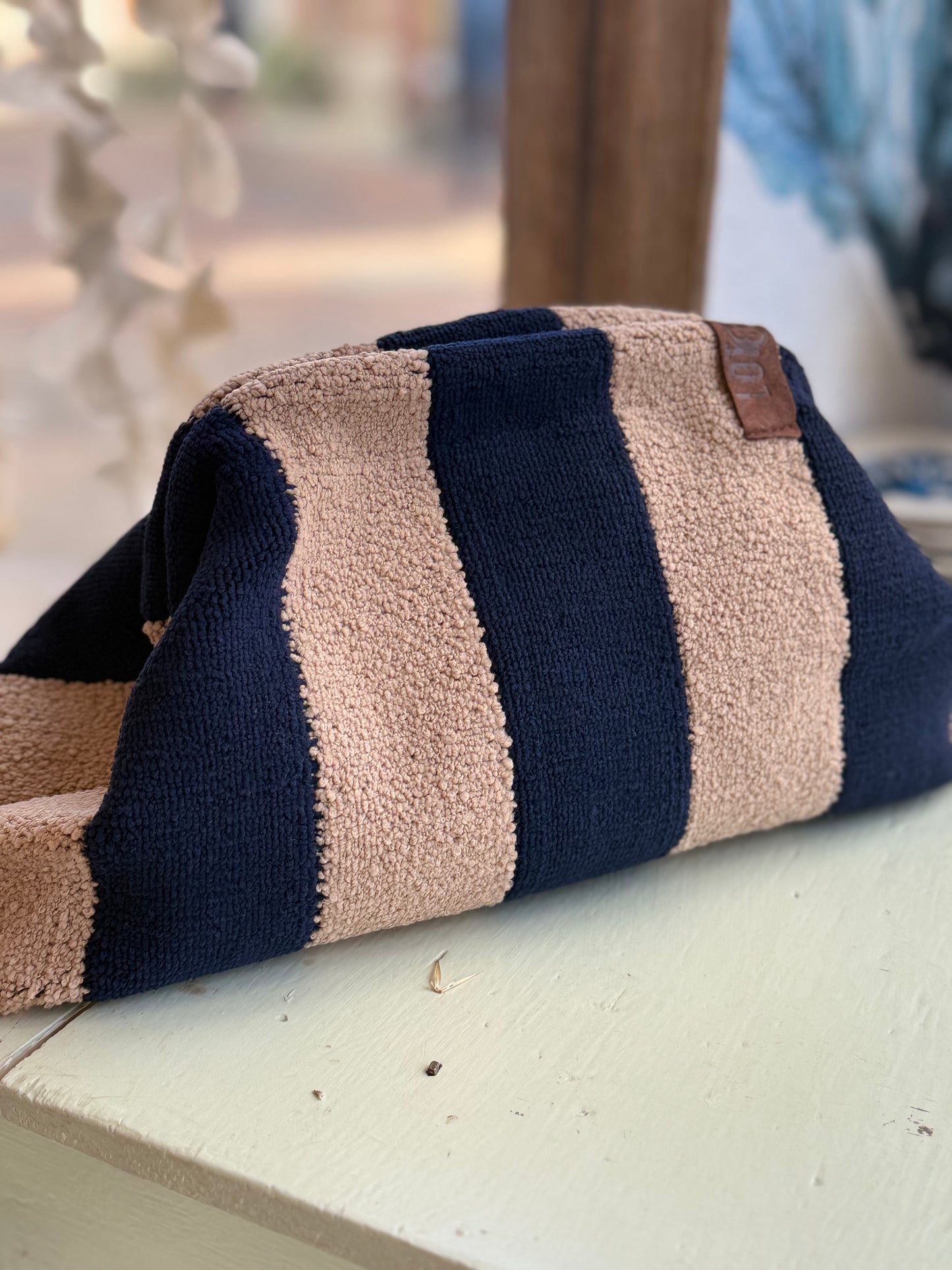 Navy and tan terry clutch bag