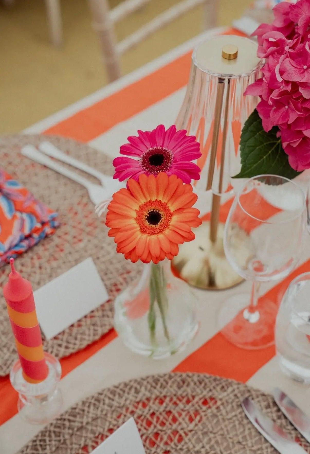 Orange and taupe striped tablecloth