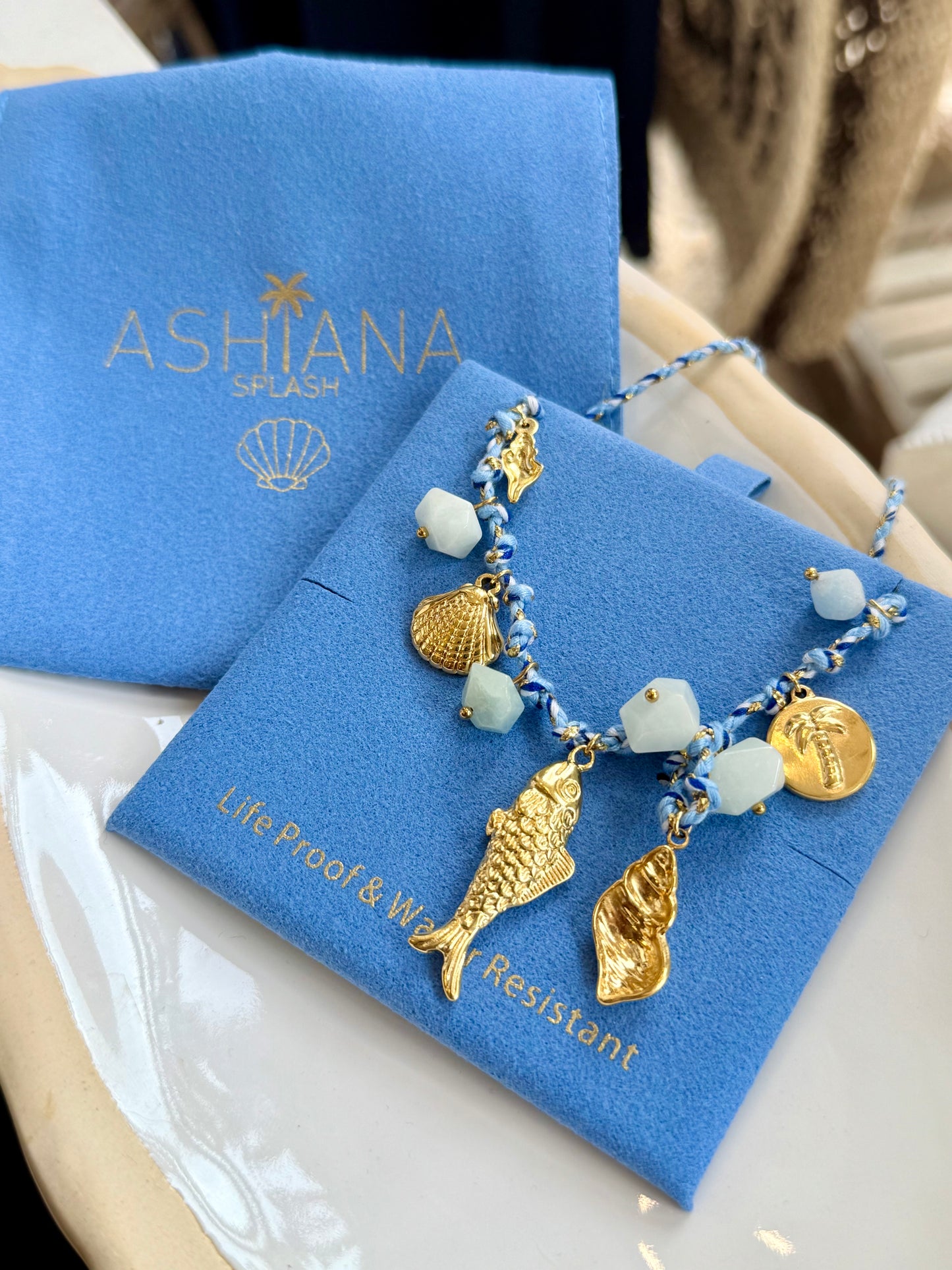 Finn Braided Fish And Shell Charm Necklace