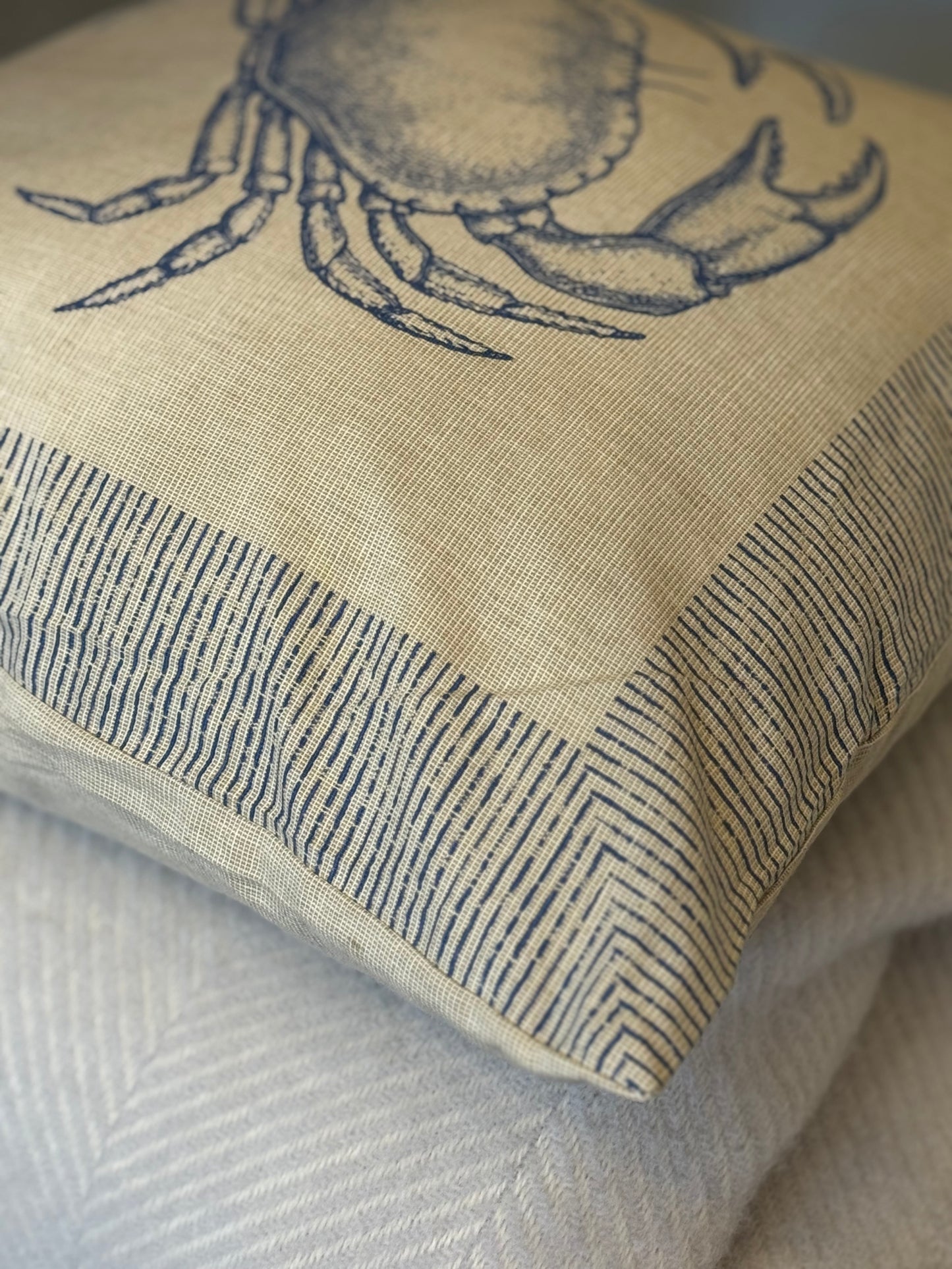 Cushion with crab motif