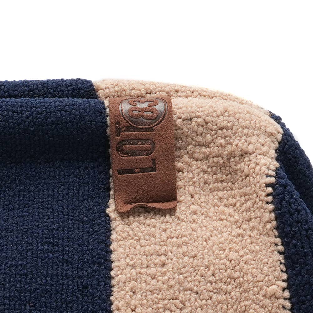 Navy and tan terry clutch bag